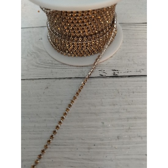 Нить стразовая стекло 2 мм SS6 шампань 36, цена за 50 см